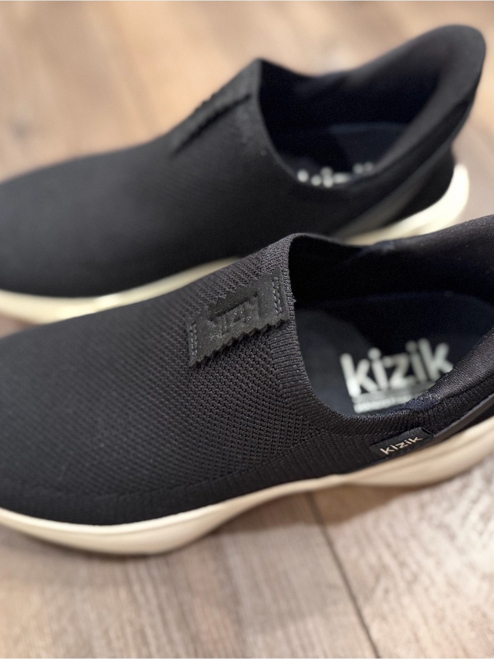 Kizik Women's Black Slip-On Athletic Shoes with Cream Sole